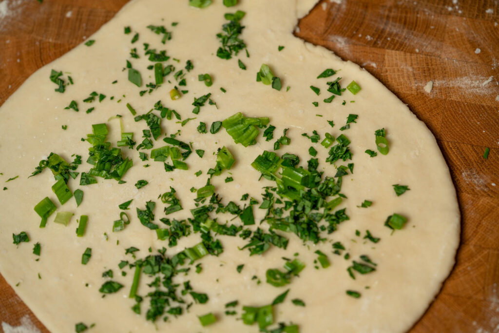 Sprinkle salt, green onion, and moringa