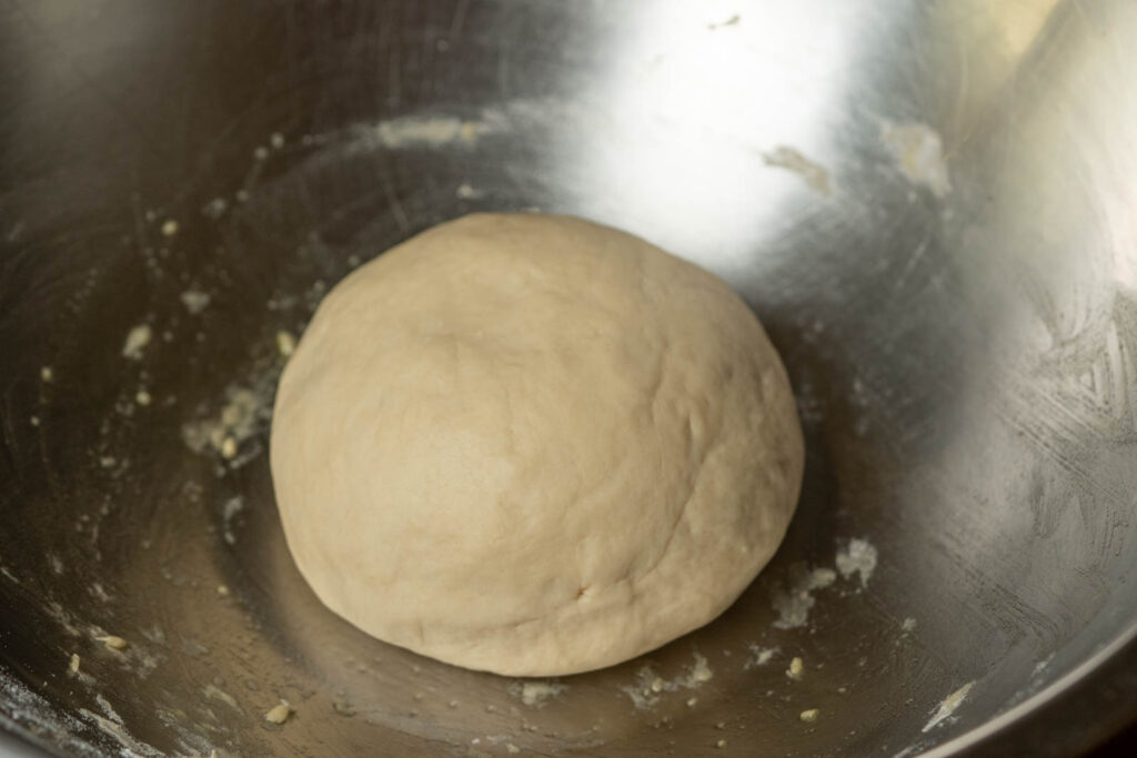 Oil your bowl and place your dough in it, covered, to rest for 45 minutes