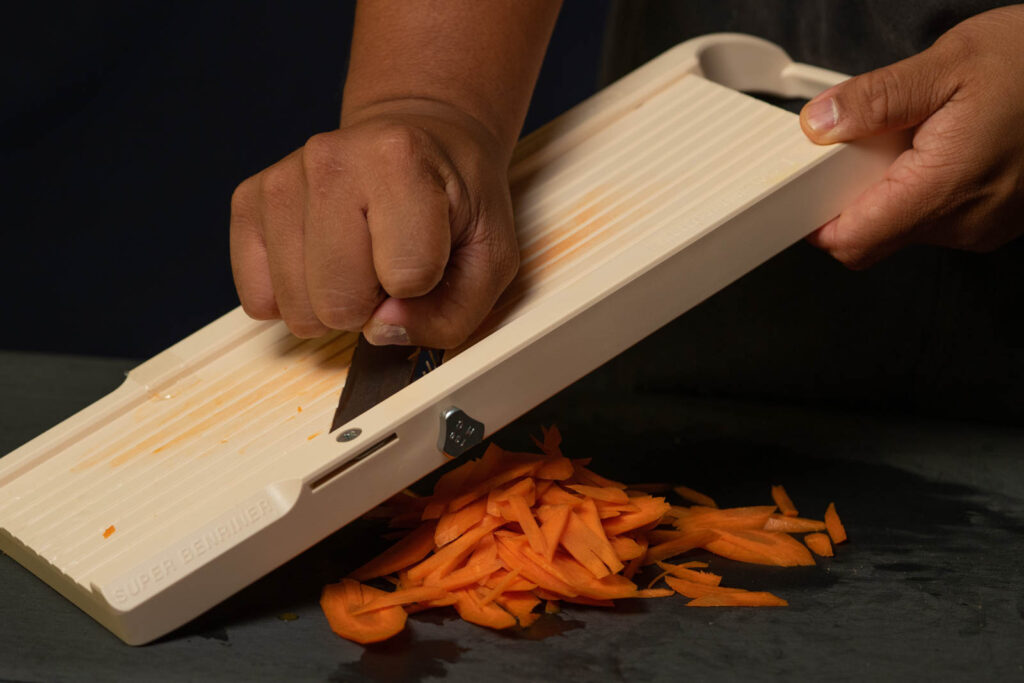 Peel & slice carrots into thin strips