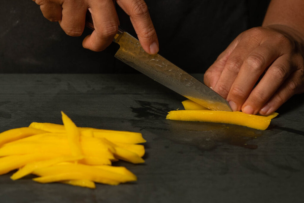 Peel & slice mango into thin strips