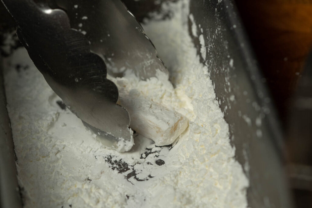 Coat with cornstarch