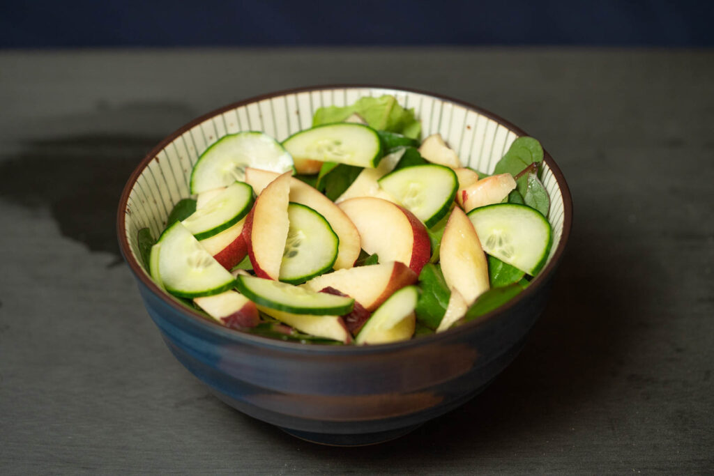 Add your sliced nectarine and cucumber