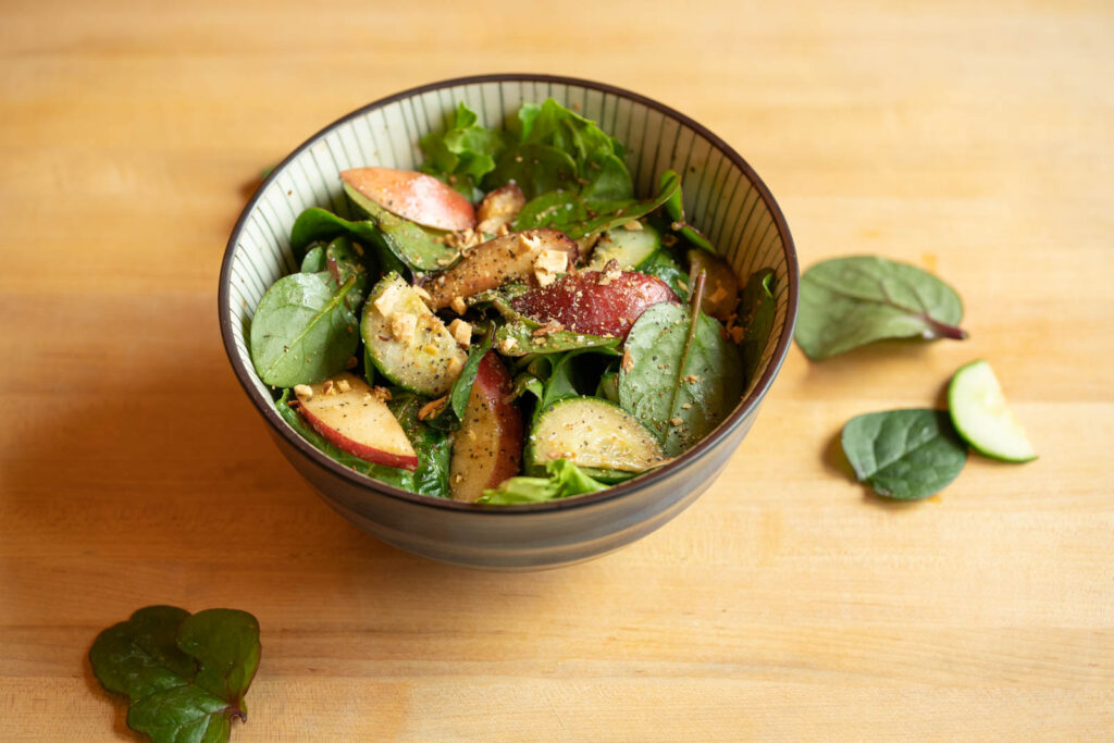 Give everything a toss, and enjoy: Malabar Spinach & Nectarine Salad