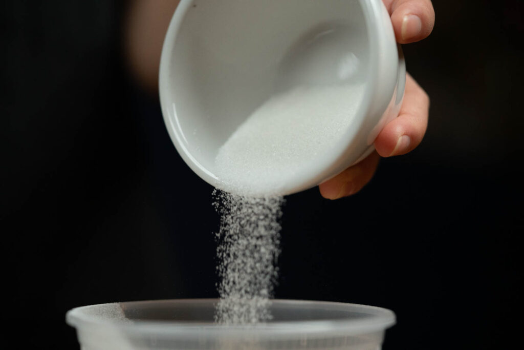 pouring sugar
