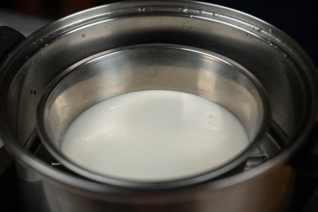 Mochi bowl sitting in steaming pot
