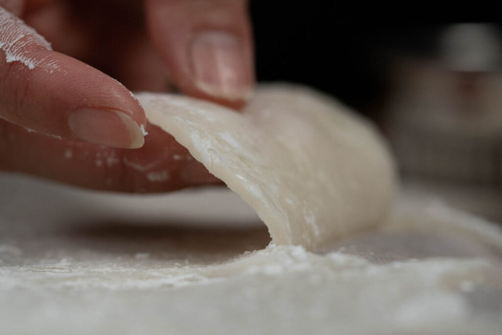 Peeling out mochi wrapper