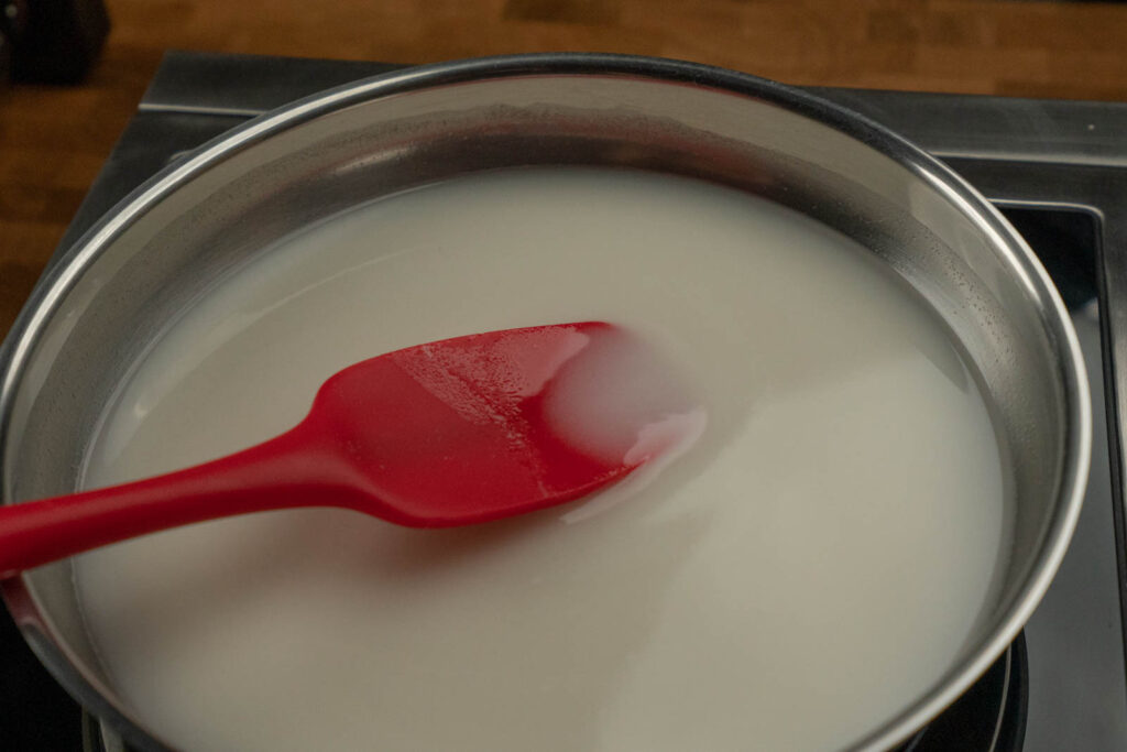 Rice flour, sugar, and water in a pan