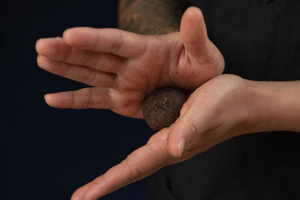 Rolling red bean paste balls