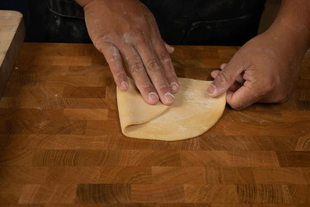 Fold dough in thirds