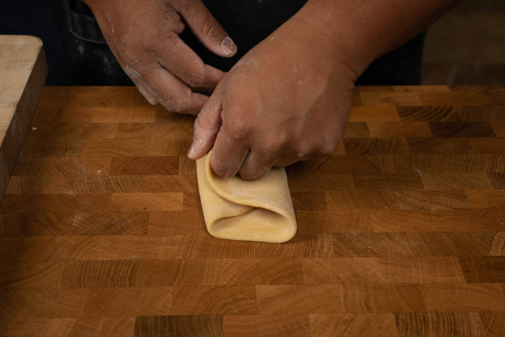 Fold dough in thirds