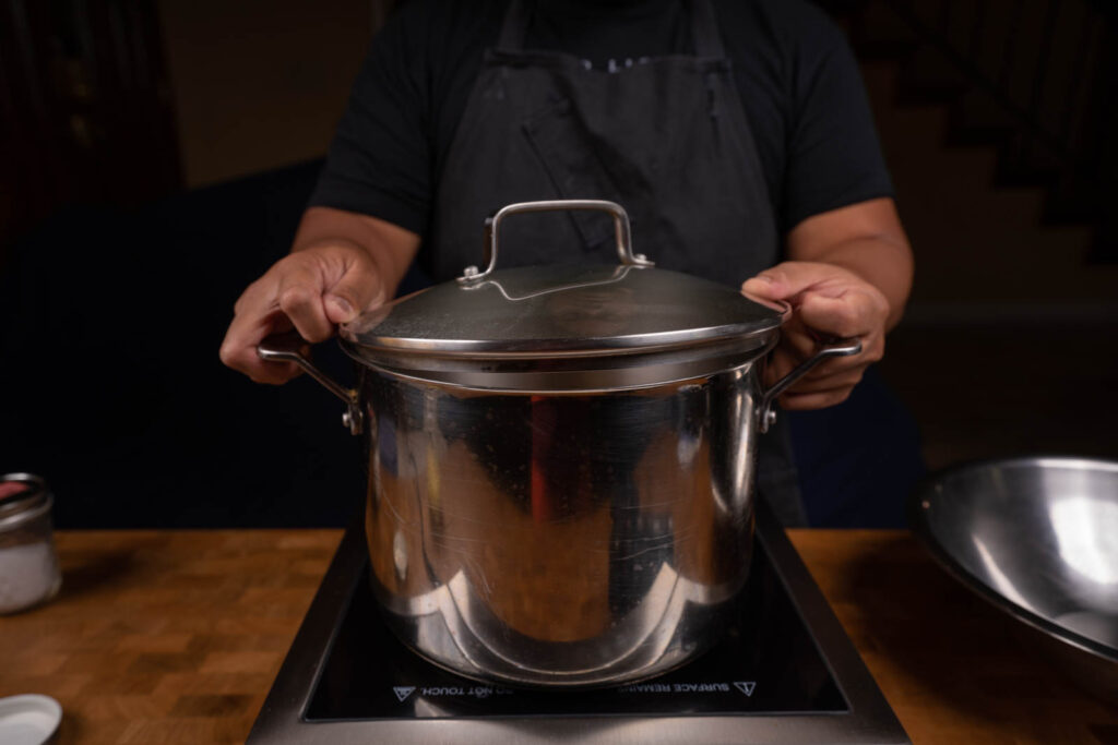 Make popcorn: Cover partially