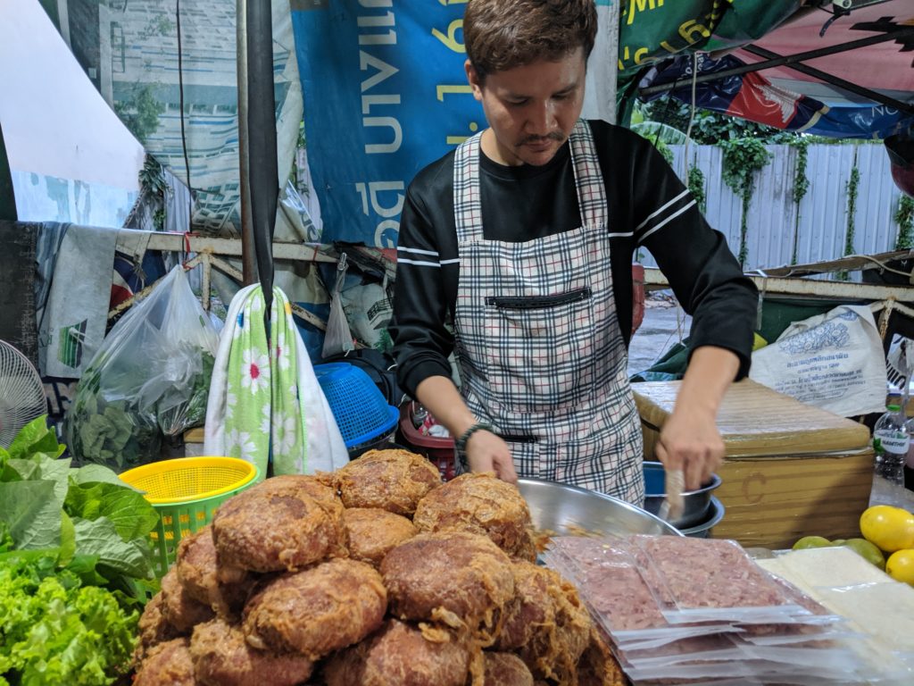 Bang Wa station street food: lettuce wrap. Bangkok, Thailand