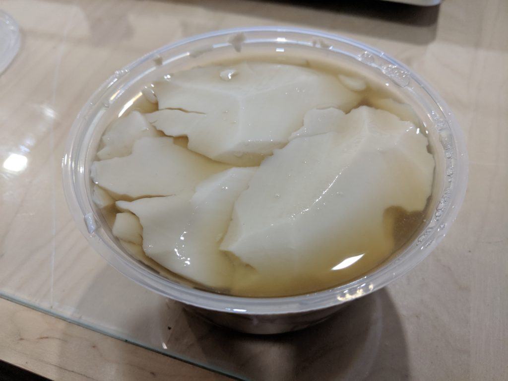 Sweet tofu (dofu fa), street vendor outside Perdana Gardens, Kuala Lumpur, Malaysia